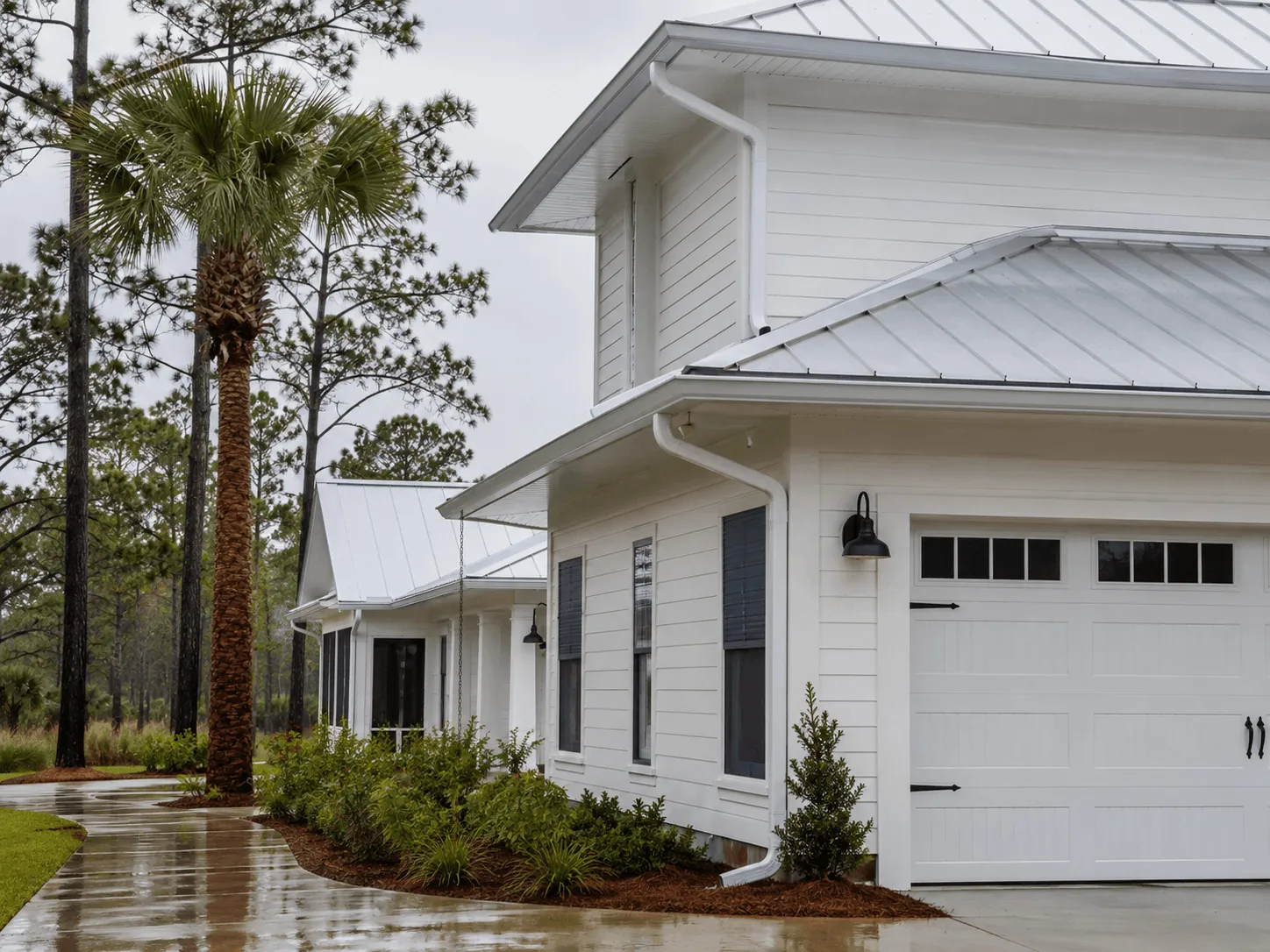 Parker home with mature pines standing close to the roof
