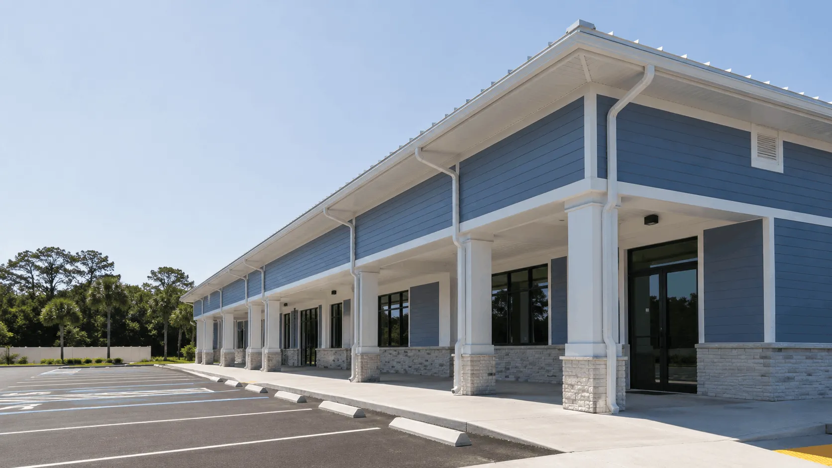 Commercial building with gutters installed along the roofline