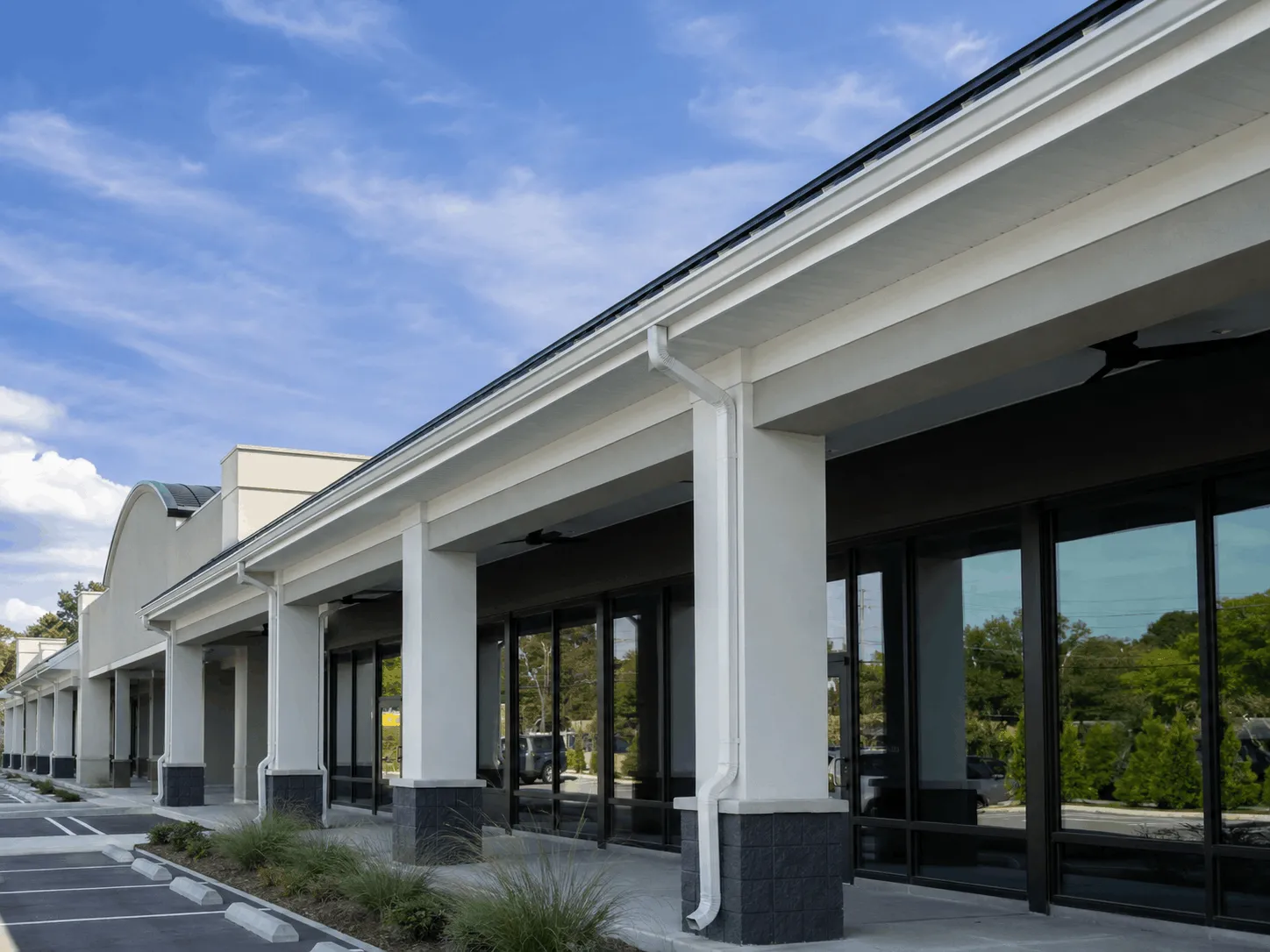 Retail building with gutters running along the roofline