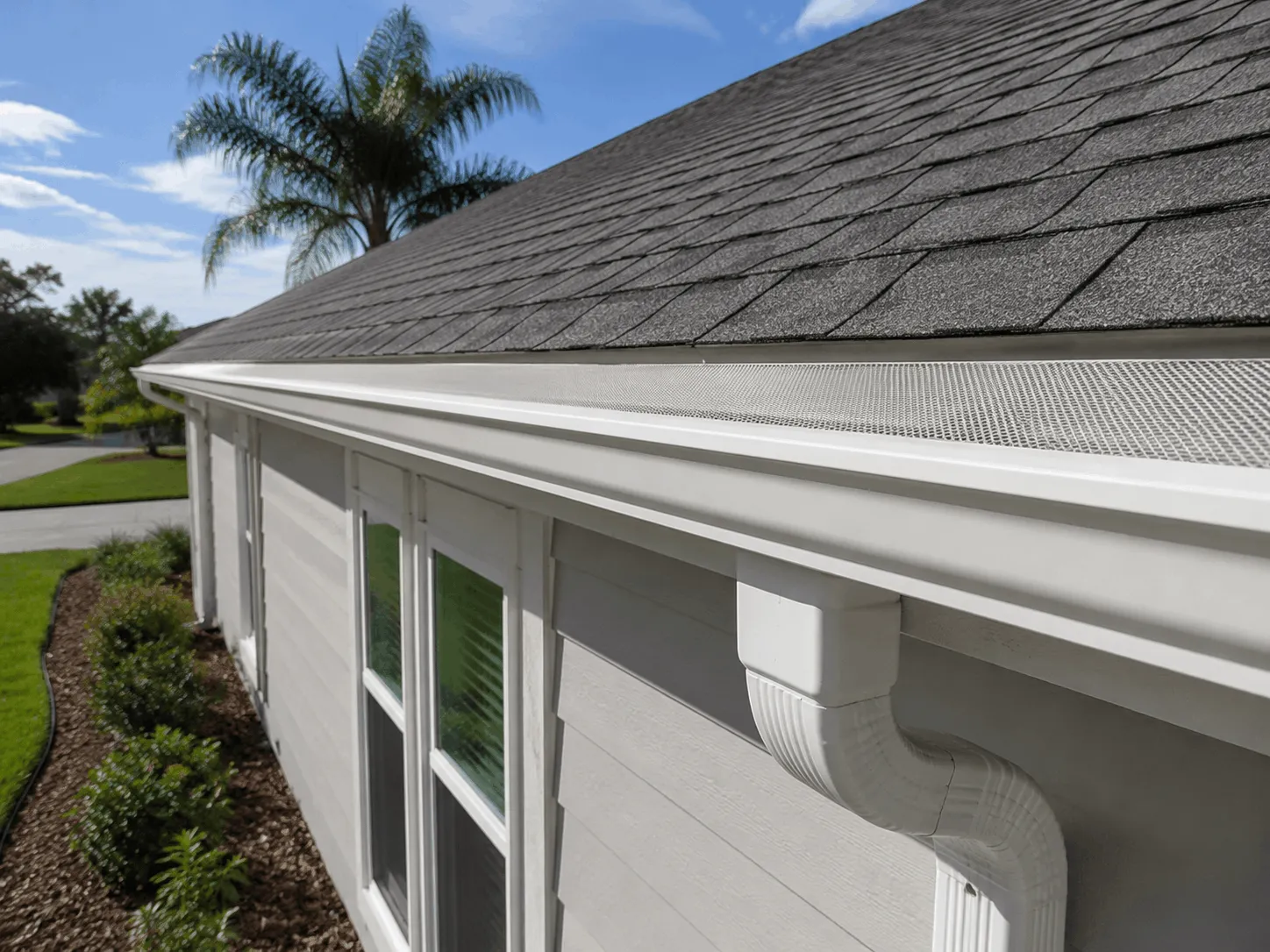 Roofline with micro-mesh guards installed along the full roofline