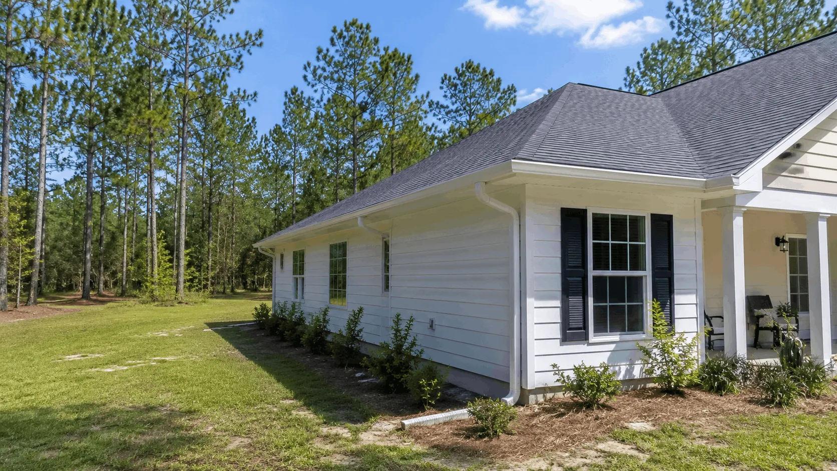 Wausau property with a metal roof and gutters along the eave